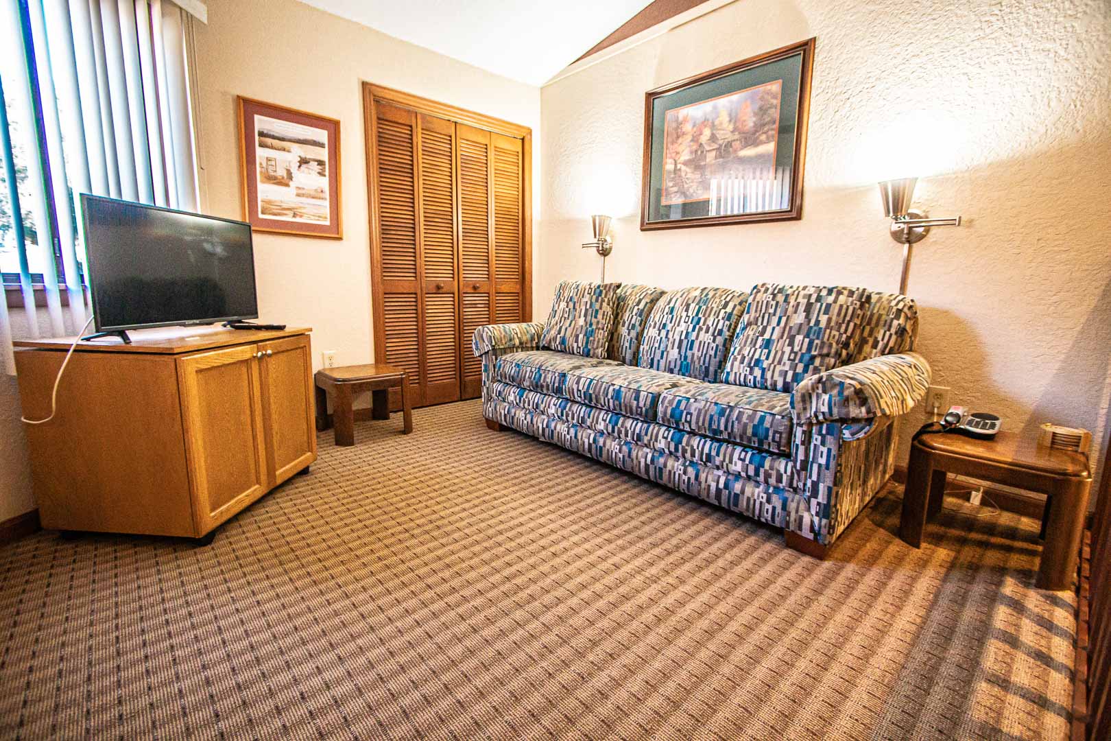 An expansive living room area at VRI's Fairways of the Mountains in North Carolina